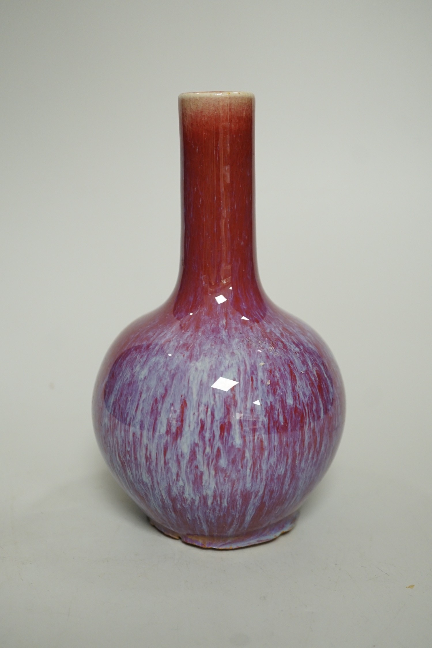 A Chinese Sang De Boeuf vase, 18 cm high